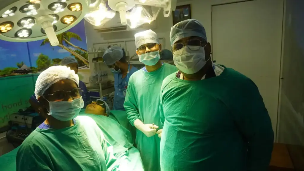 Doctor examining patient during surgery